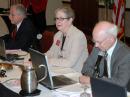 ARRL President Kay Craigie, N3KN, along with First Vice President Rick Roderick, K5UR (left), and Secretary David Sumner, K1ZZ, prepares to open the 2010 Second Meeting of the ARRL Board of Directors. [Steve Ford, WB8IMY, Photo]